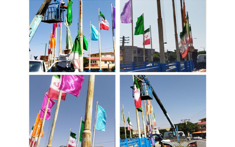 Raising-the-flag-of-the-Islamic-Republic-of-Iran-on-the-9th-Day-Bridge-in-Noorabad-Post-Img